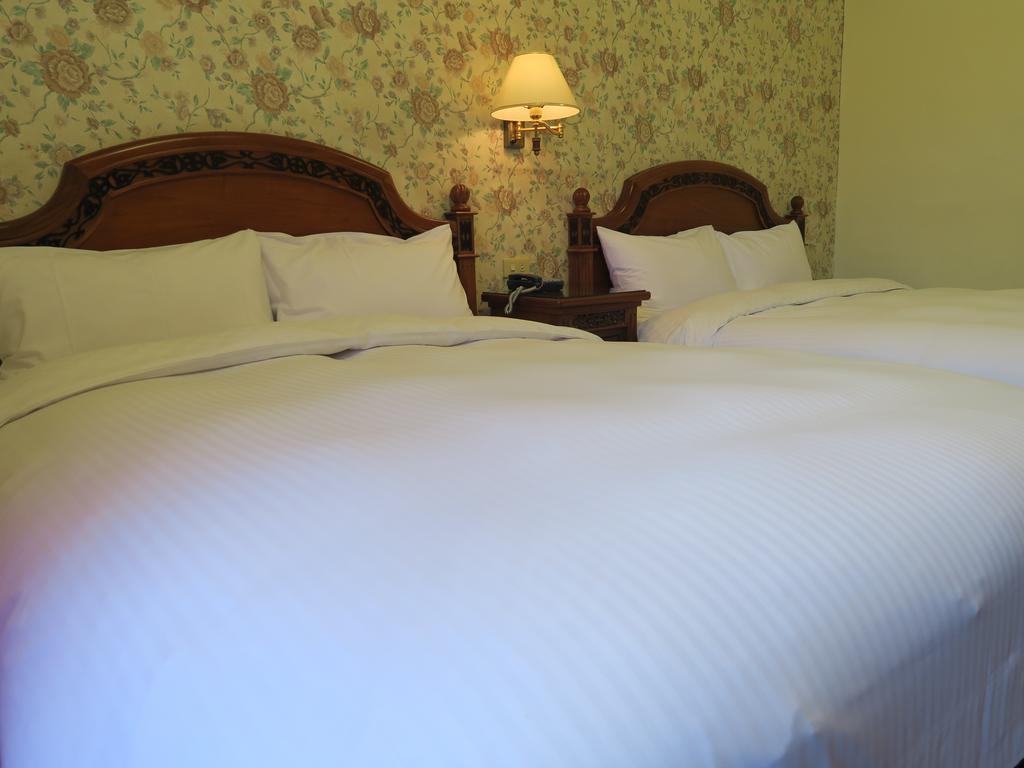Champagne Hotel Цзяоси Экстерьер фото