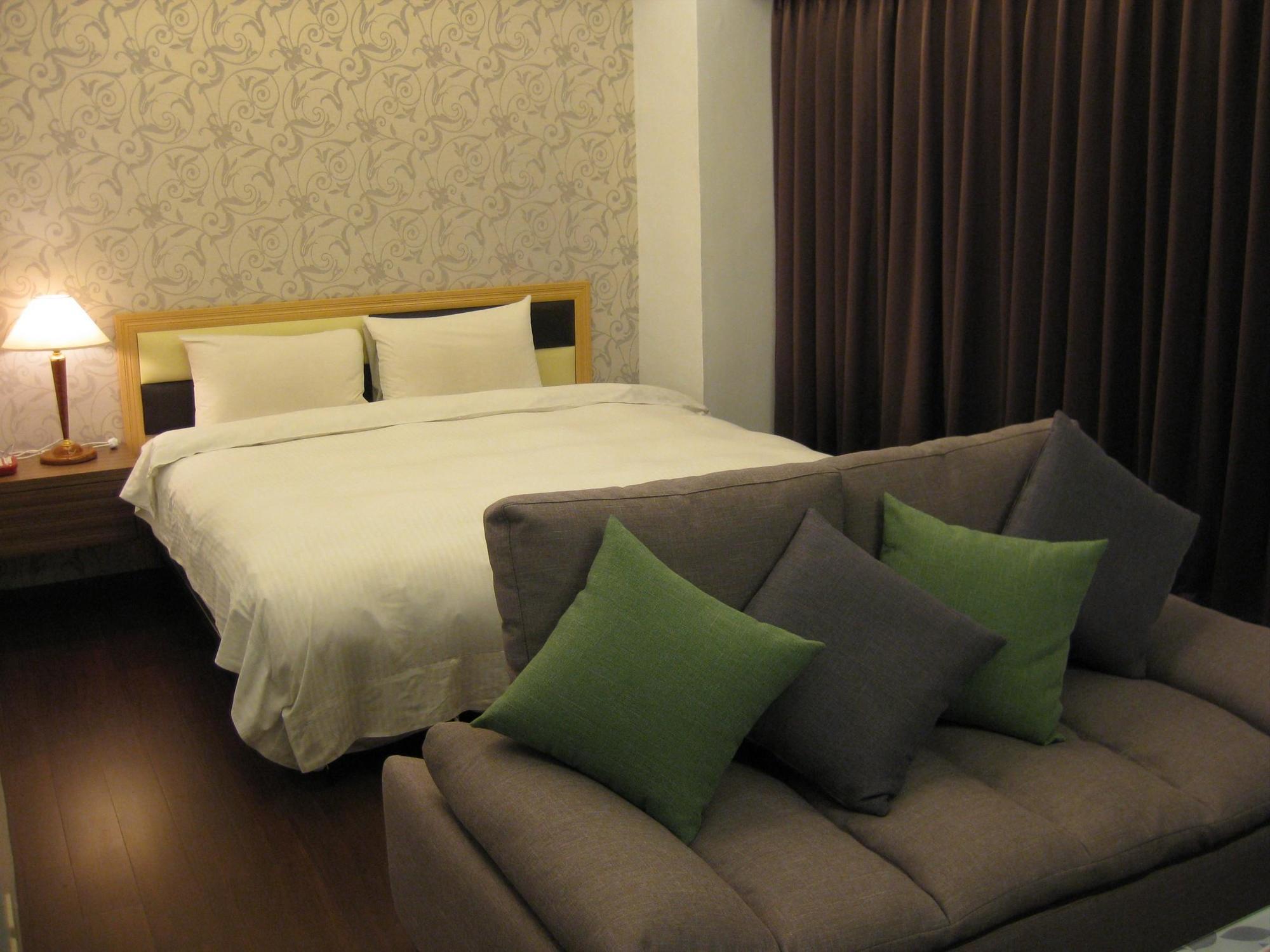 Champagne Hotel Цзяоси Экстерьер фото