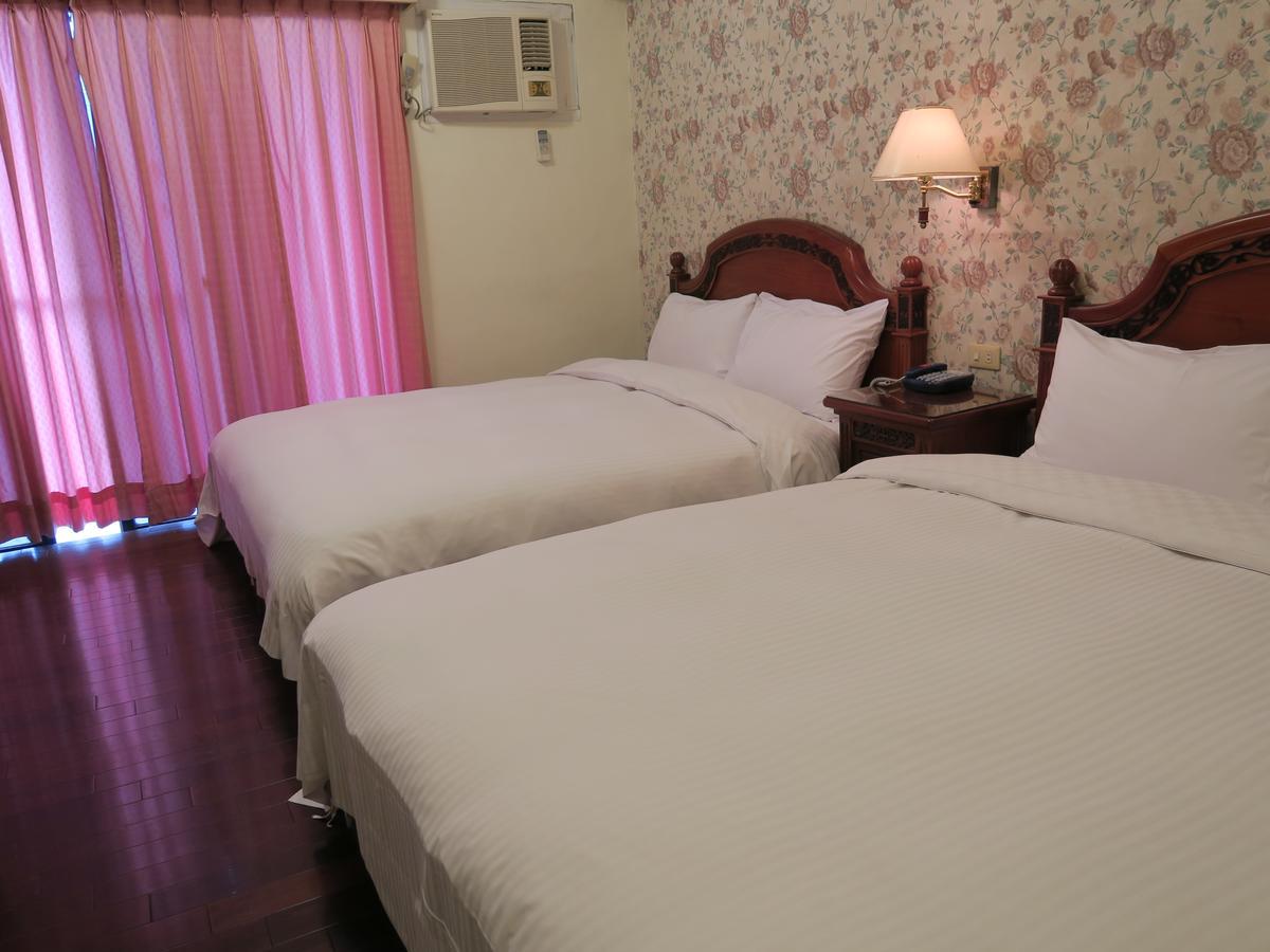 Champagne Hotel Цзяоси Экстерьер фото