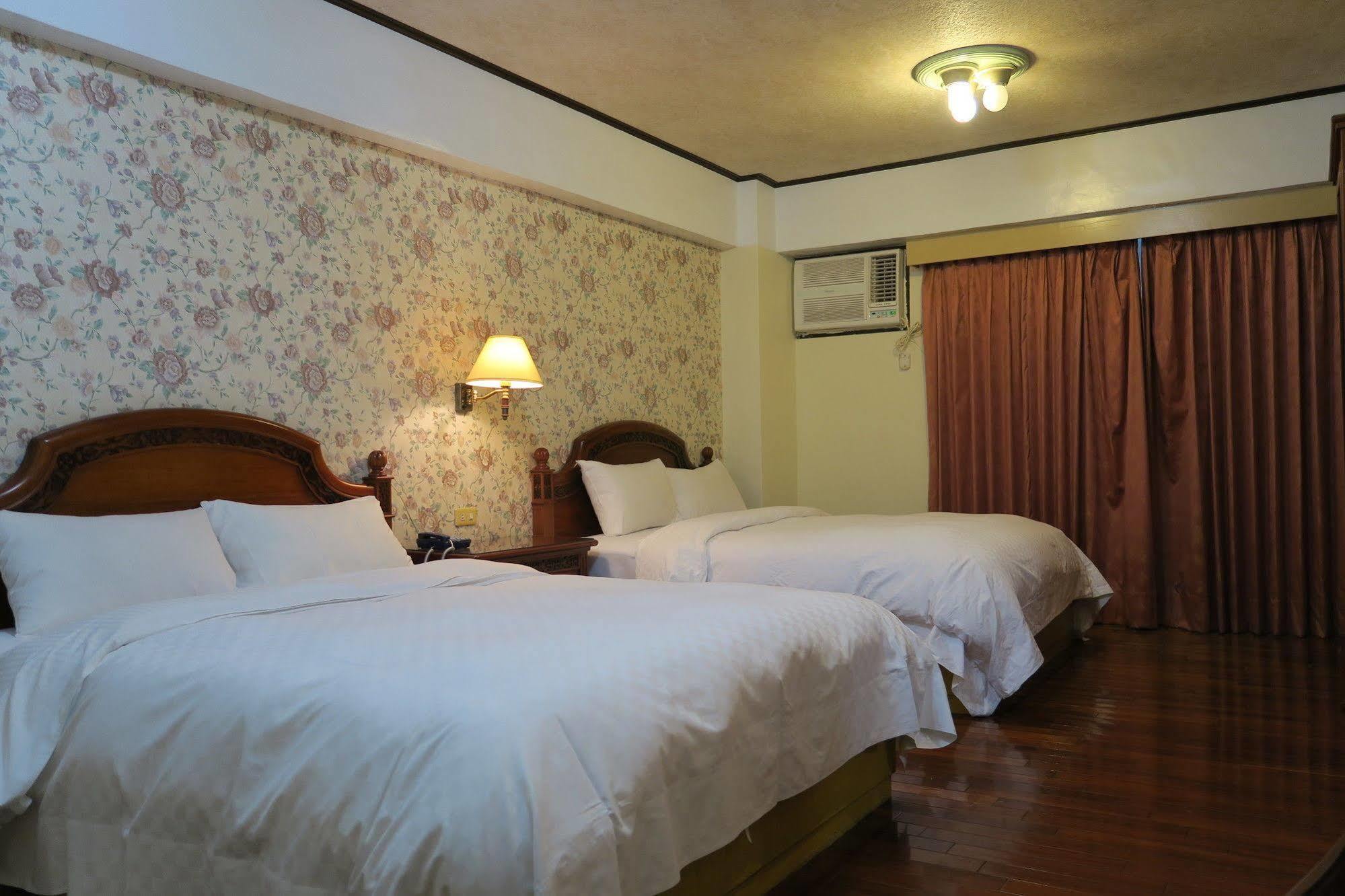 Champagne Hotel Цзяоси Экстерьер фото