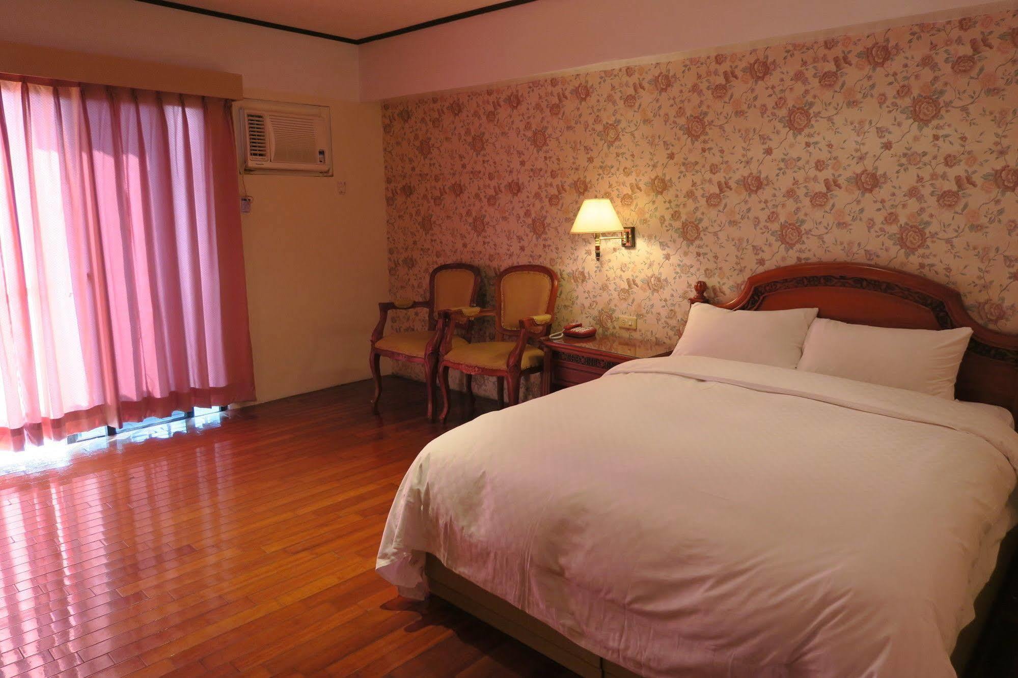 Champagne Hotel Цзяоси Экстерьер фото
