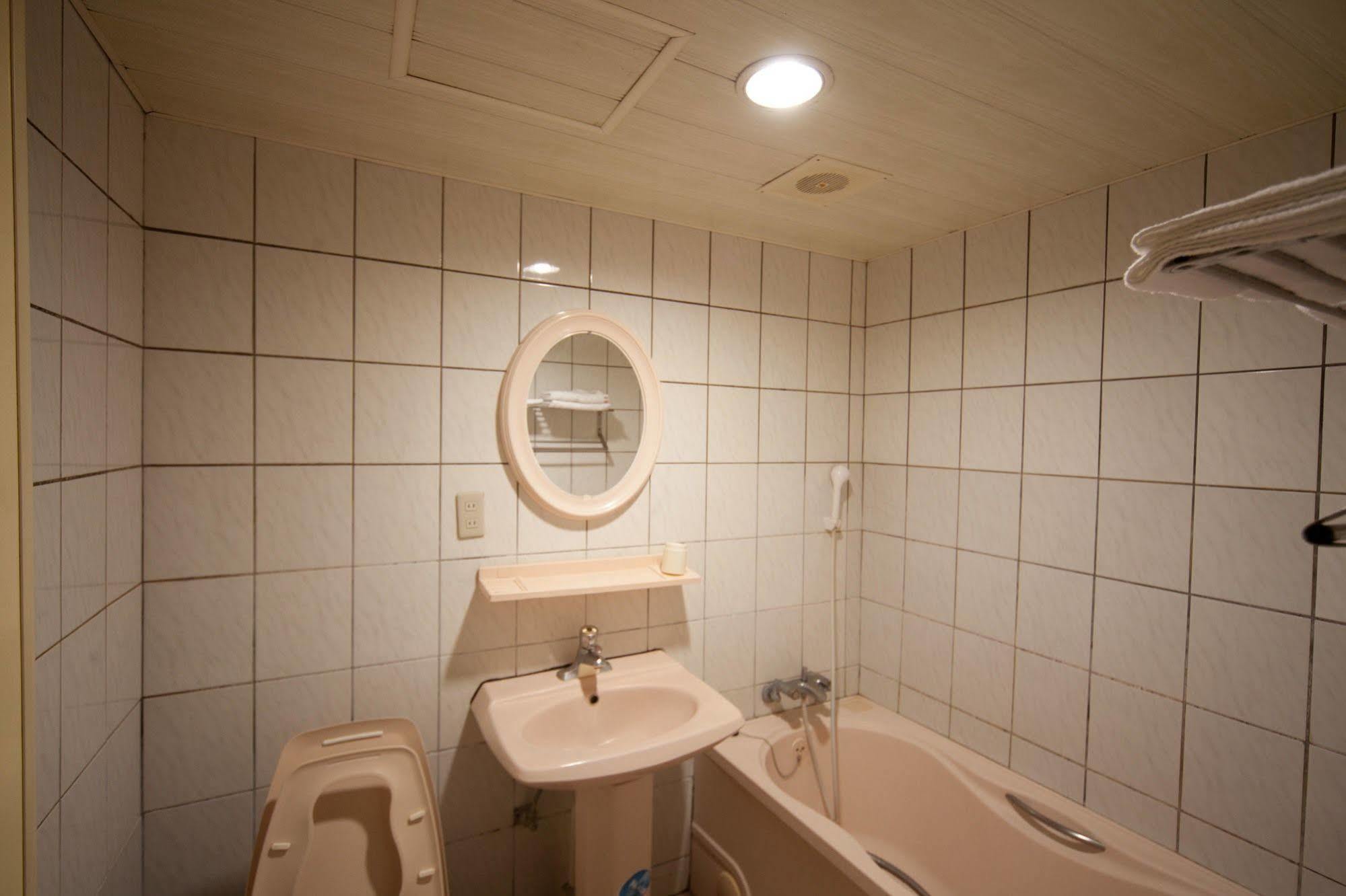 Champagne Hotel Цзяоси Экстерьер фото