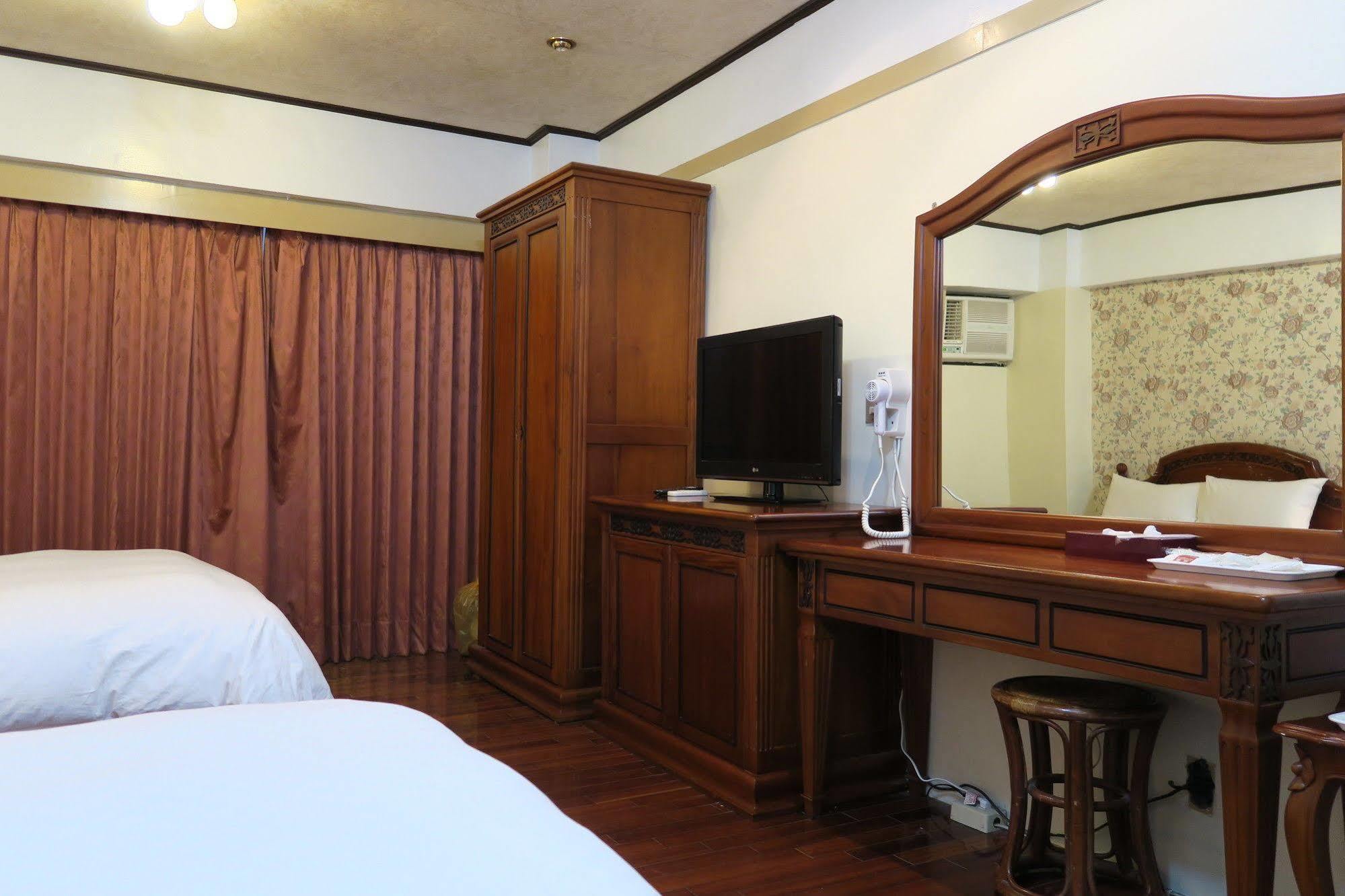 Champagne Hotel Цзяоси Экстерьер фото