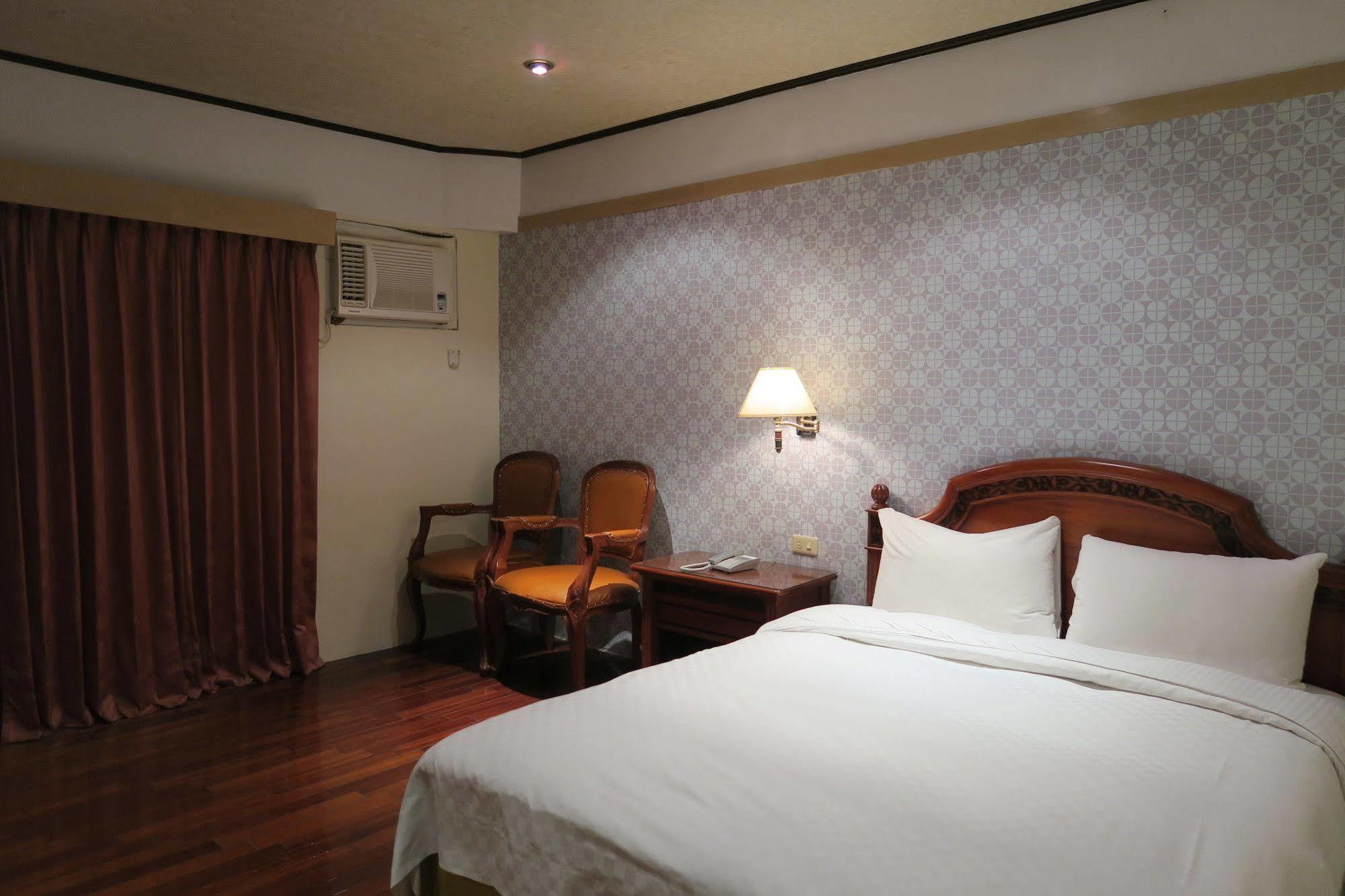 Champagne Hotel Цзяоси Экстерьер фото