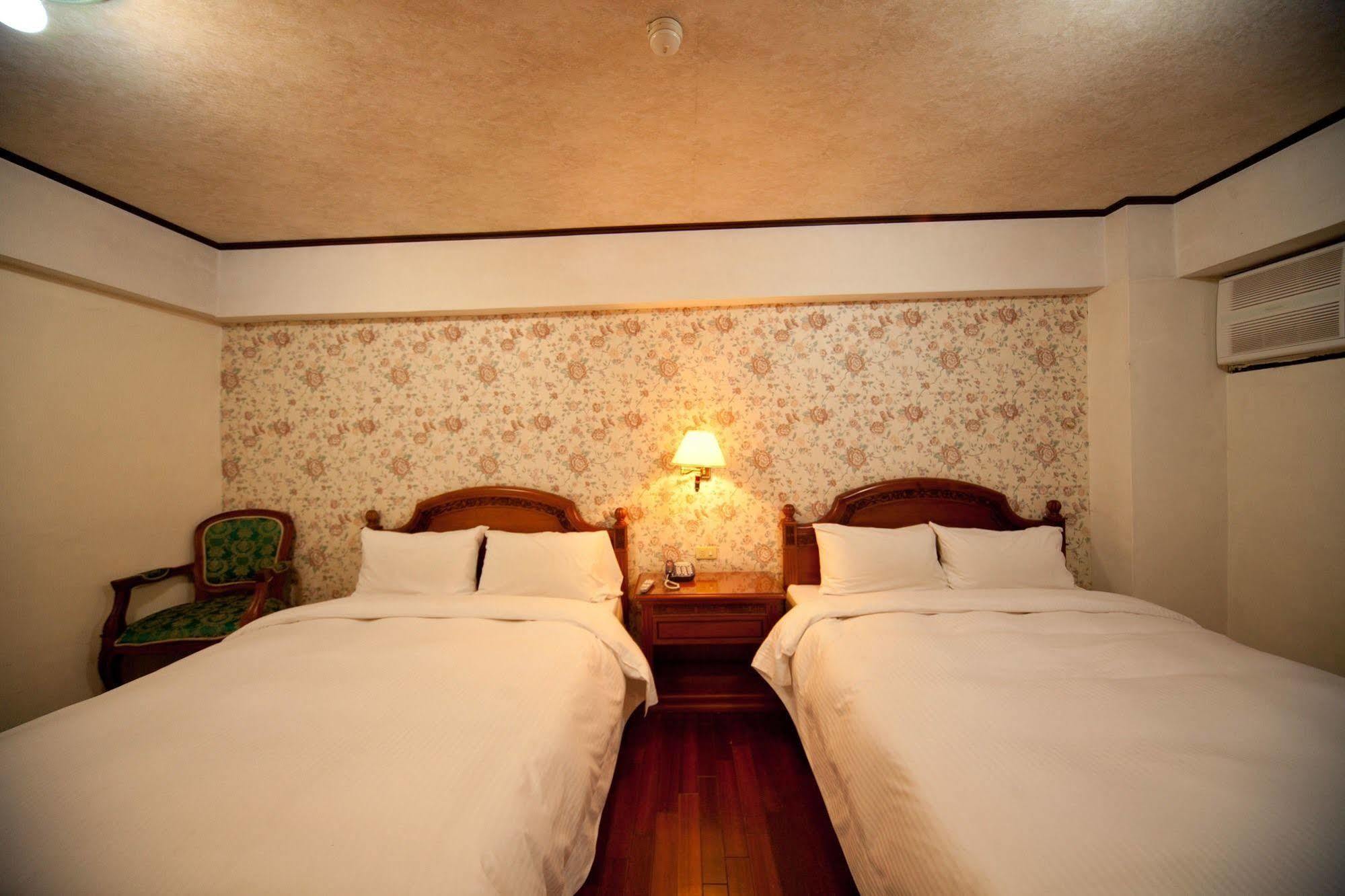 Champagne Hotel Цзяоси Экстерьер фото