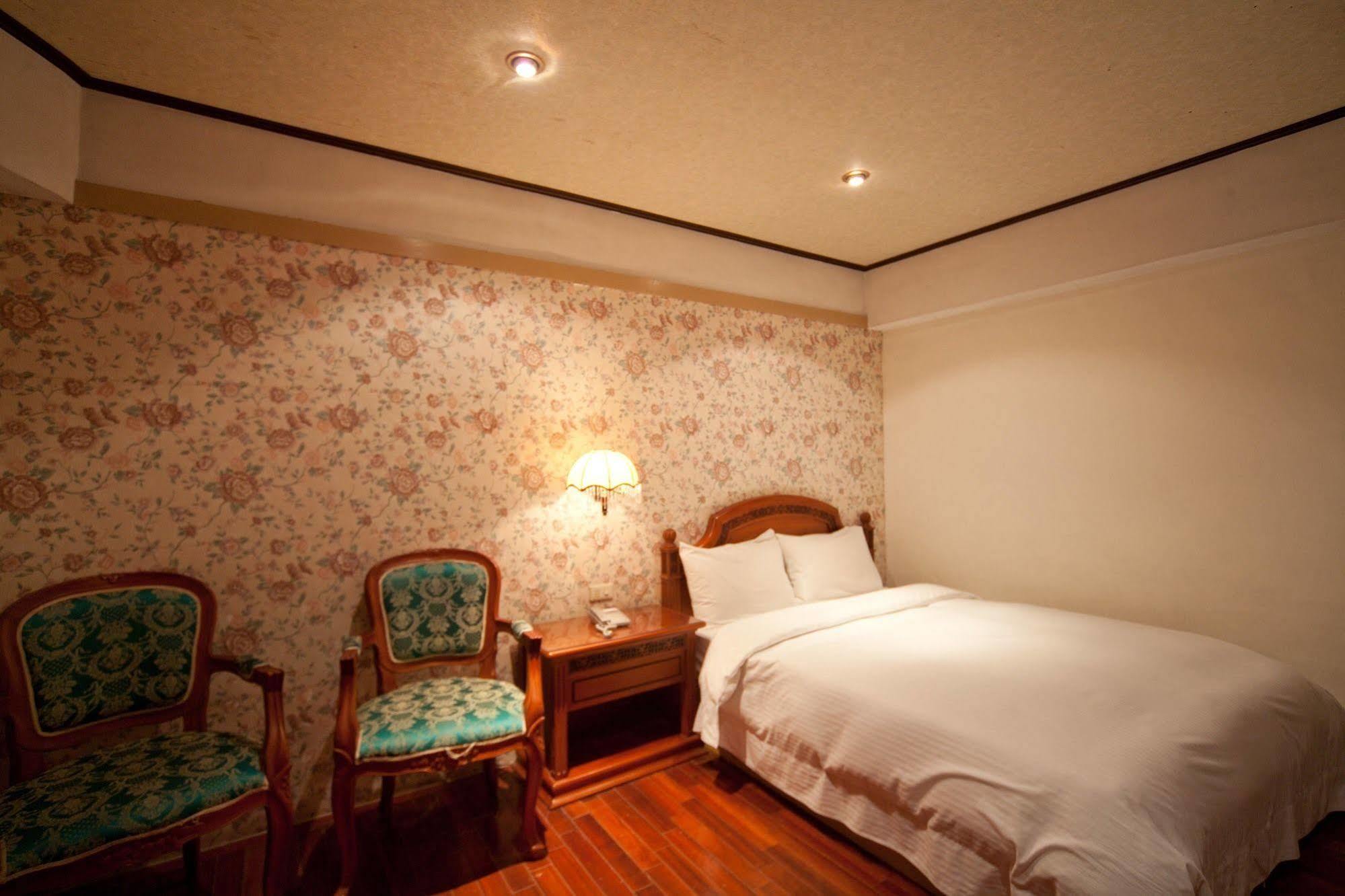 Champagne Hotel Цзяоси Экстерьер фото