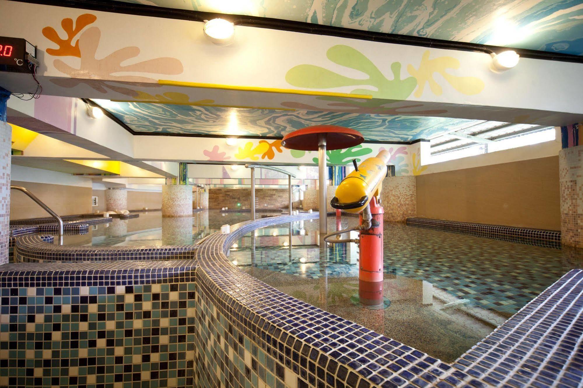 Champagne Hotel Цзяоси Экстерьер фото